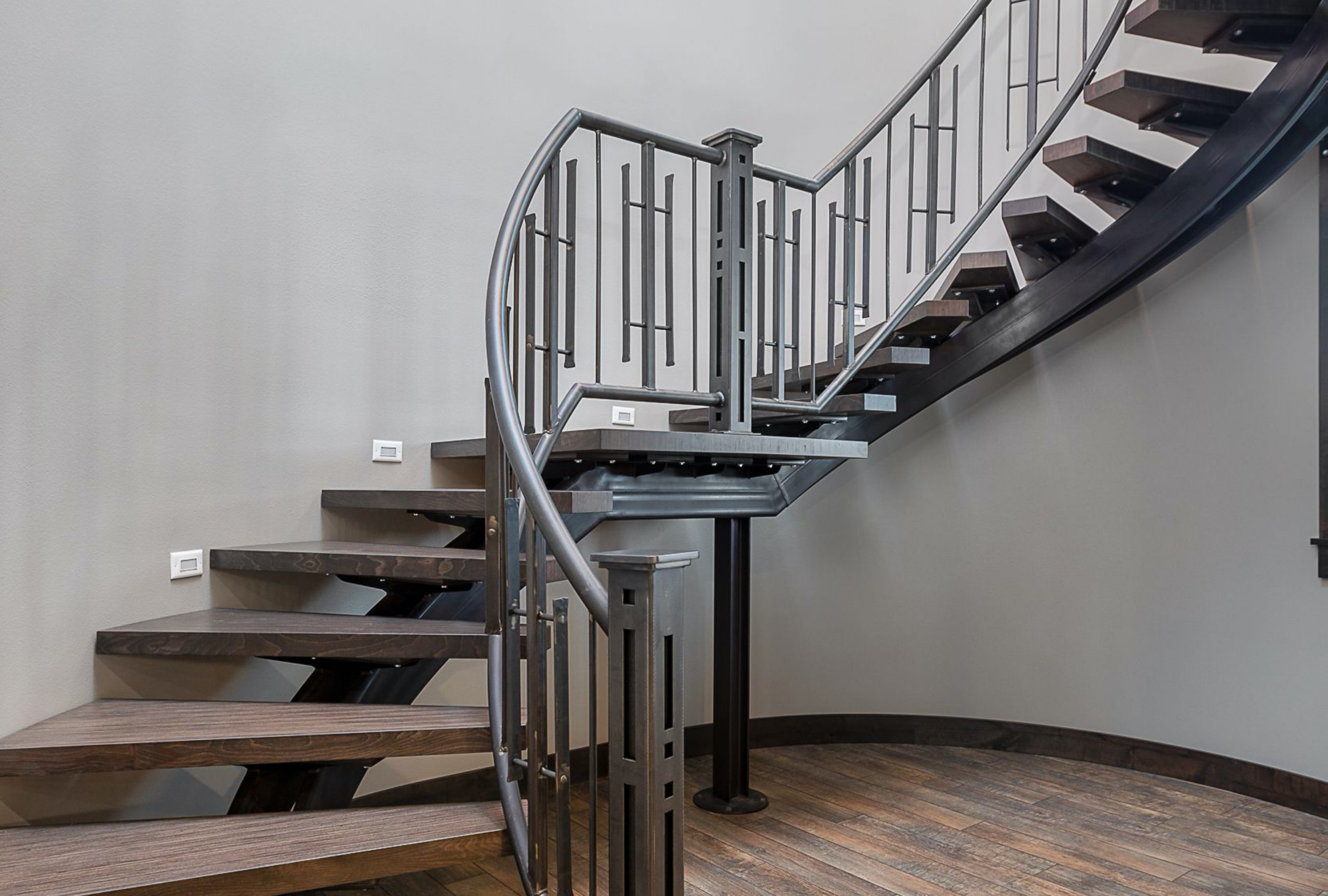Curved staircase designed by Ban Construction